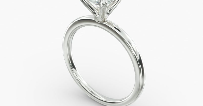 Classic solitaire diamond engagement ring with round brilliant diamond and six‑prong setting