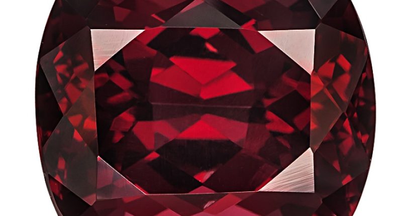 Natural red garnet gemstone showing deep colour and crystal structure for January birthstone jewellery